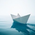 A paper boat on the water