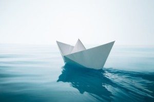 A paper boat on the water