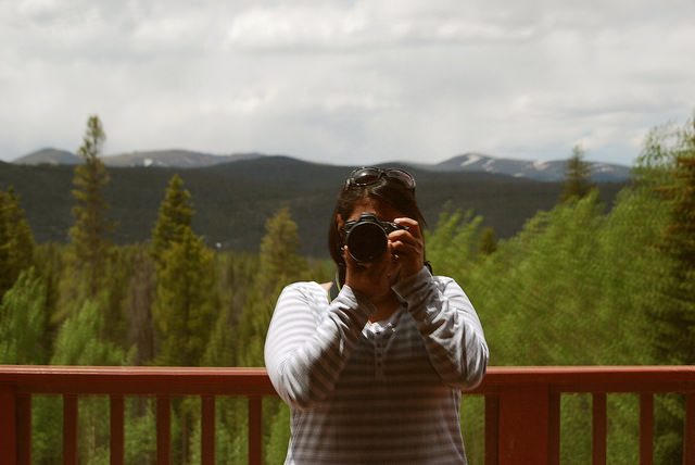 Sheryle taking a picture of the mountains