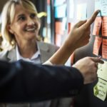 Collaborating at a board with sticky notes