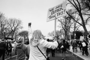 "We are better than this" sign at a protest