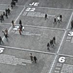 Overhead view of people walking in a city square