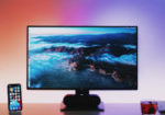 An iMac on a clean desk.